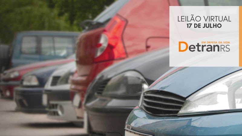 veículos estacionados lado a lado e box onde está escrito leilão virtual 17 de julho detranrs em defesa da vida